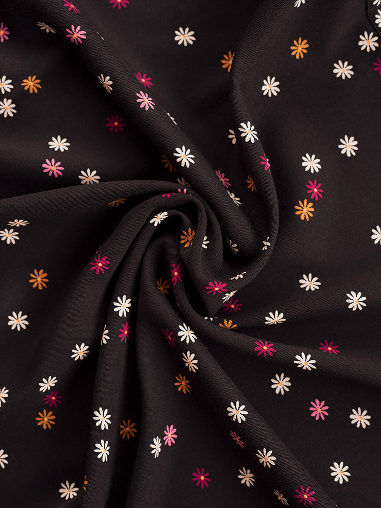 Jupe Naomi portefeuille à marguerites noires