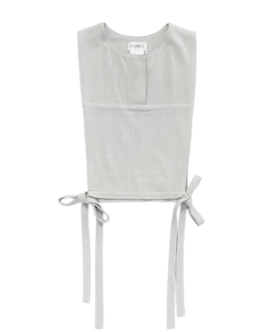 Plastron gris pâle en lin. Blouse en lin sans manche pour femme.